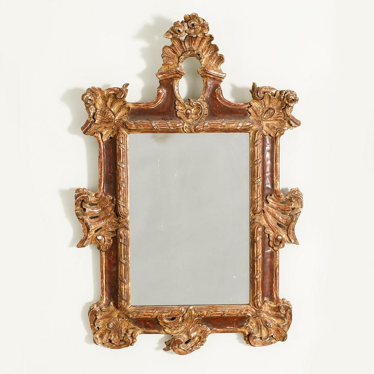 A 20th century mirror in baroque style.