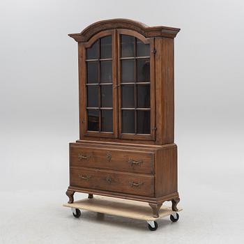 A display cabinet, 18th Century.
