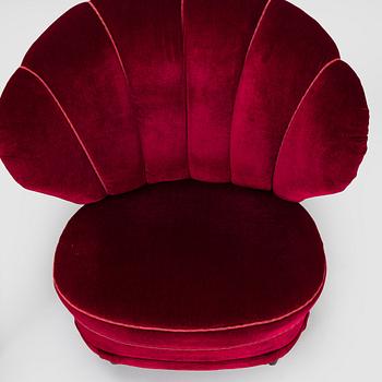 A pair of mid-20th century armchairs.