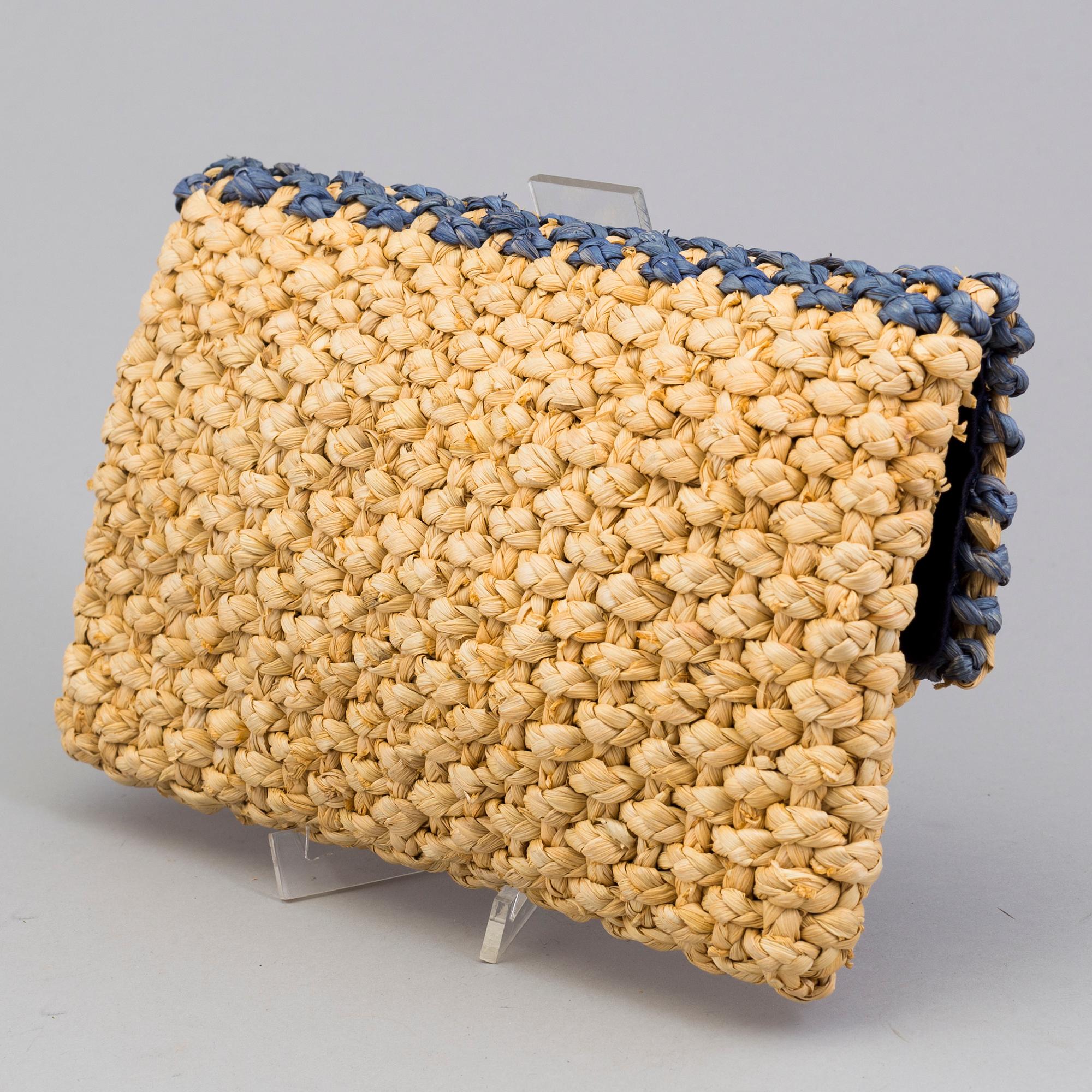 A  bast clutch by Ralph Lauren.