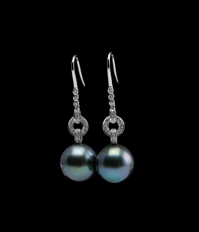 A PAIR OF EARRINGS, Tahitian pearls 13 mm, brilliant cut diamonds c. 0.25 ct. 18K white gold. Weight 8,7 g.