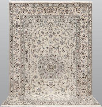 A Nain carpet, part silk, so-called 6LAA, approx. 301 x 198 cm.