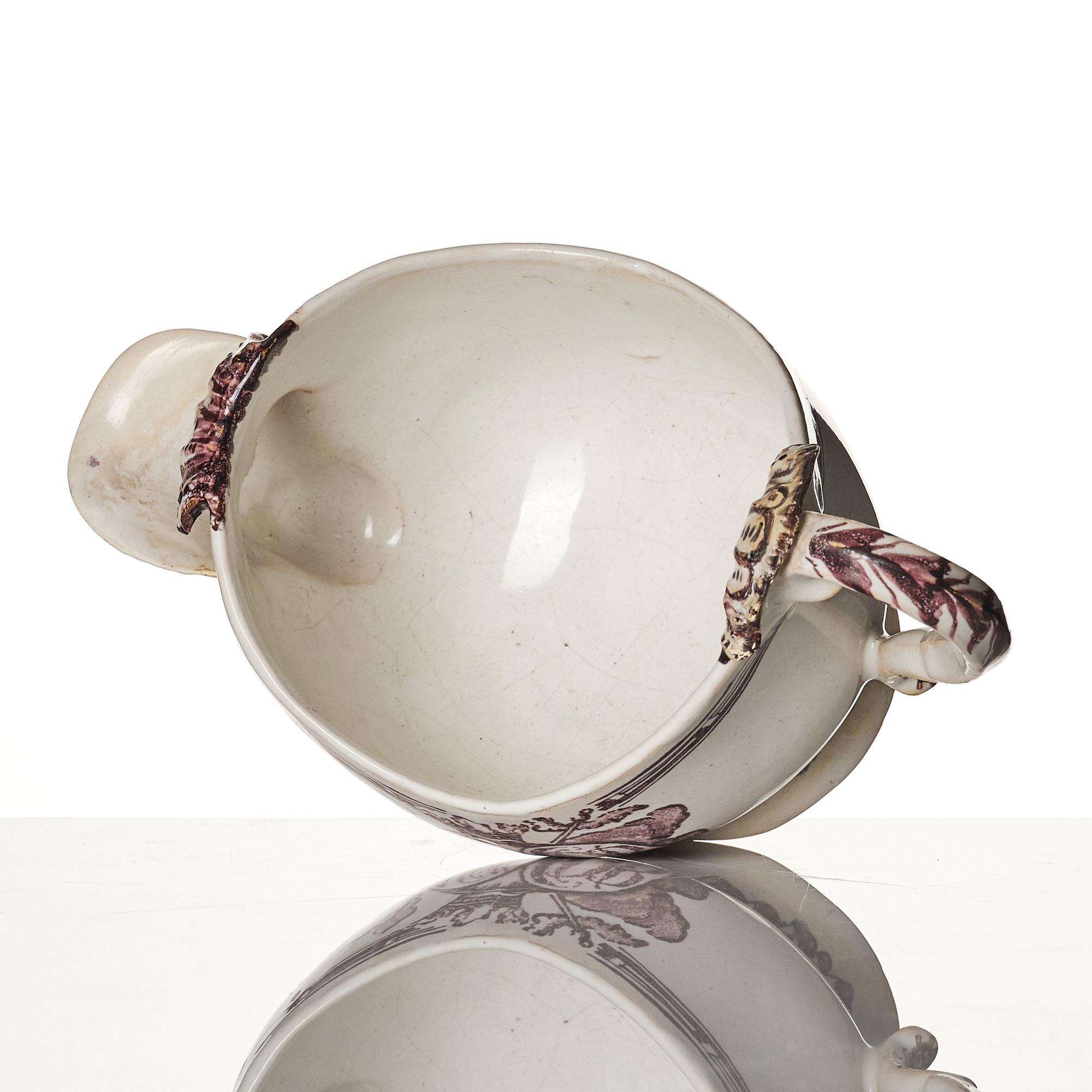 A Swedish Rörstrand faience sauce boat/creamer, 18th Century.