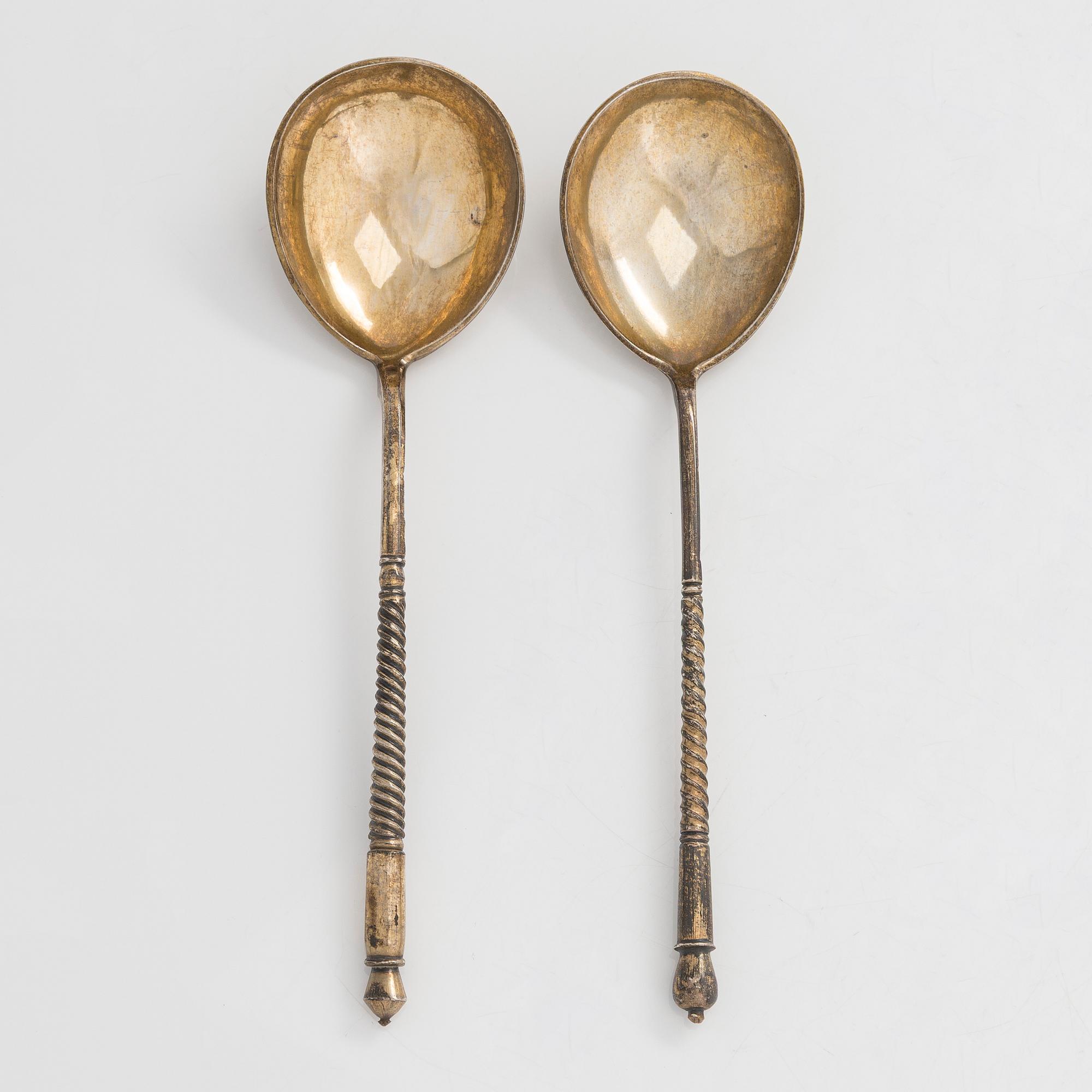 Two 19th-century parcel-gilt silver spoons, Moscow 1877-98.