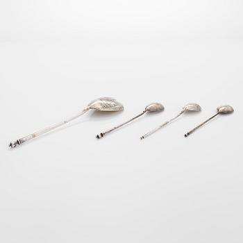 Three silver tea glass holders and four spoons, silver Kostroma and Moscow, late 19th and early 20th centuries.