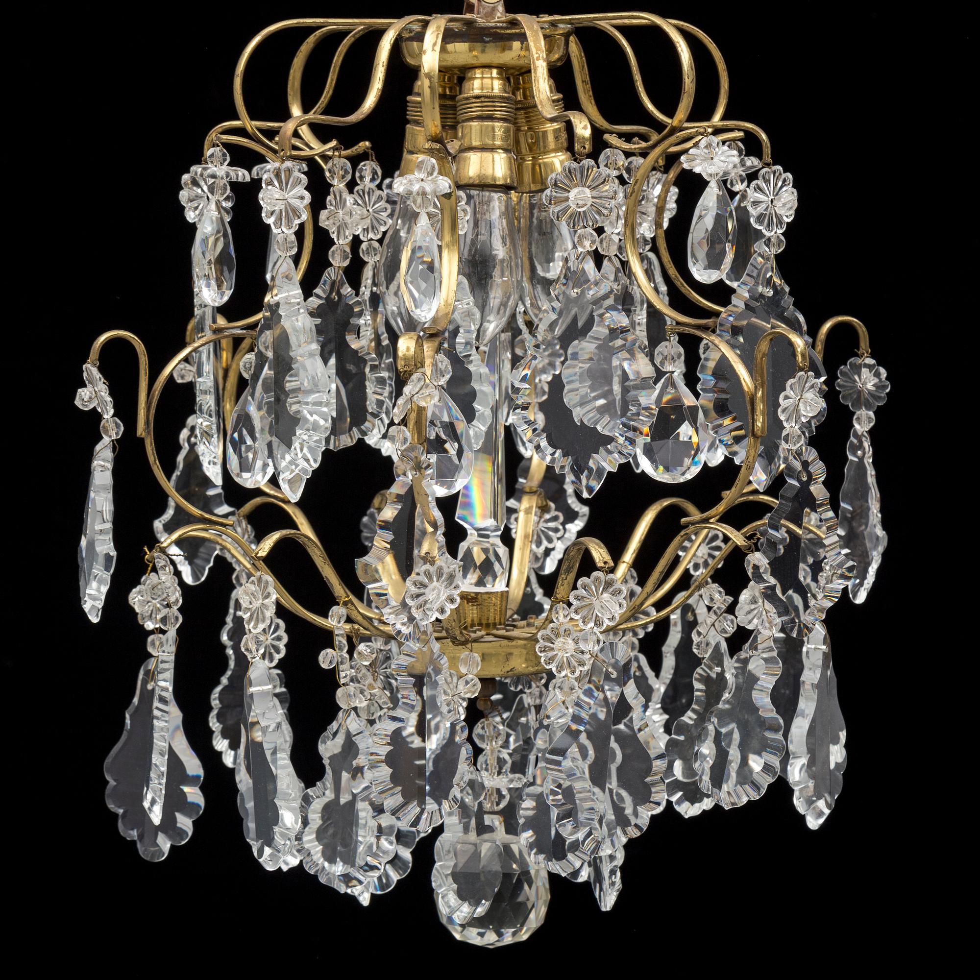 An early 20th century baroque style ceiling light.