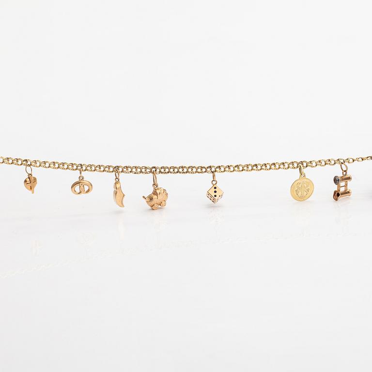 A 14K gold bracelet.