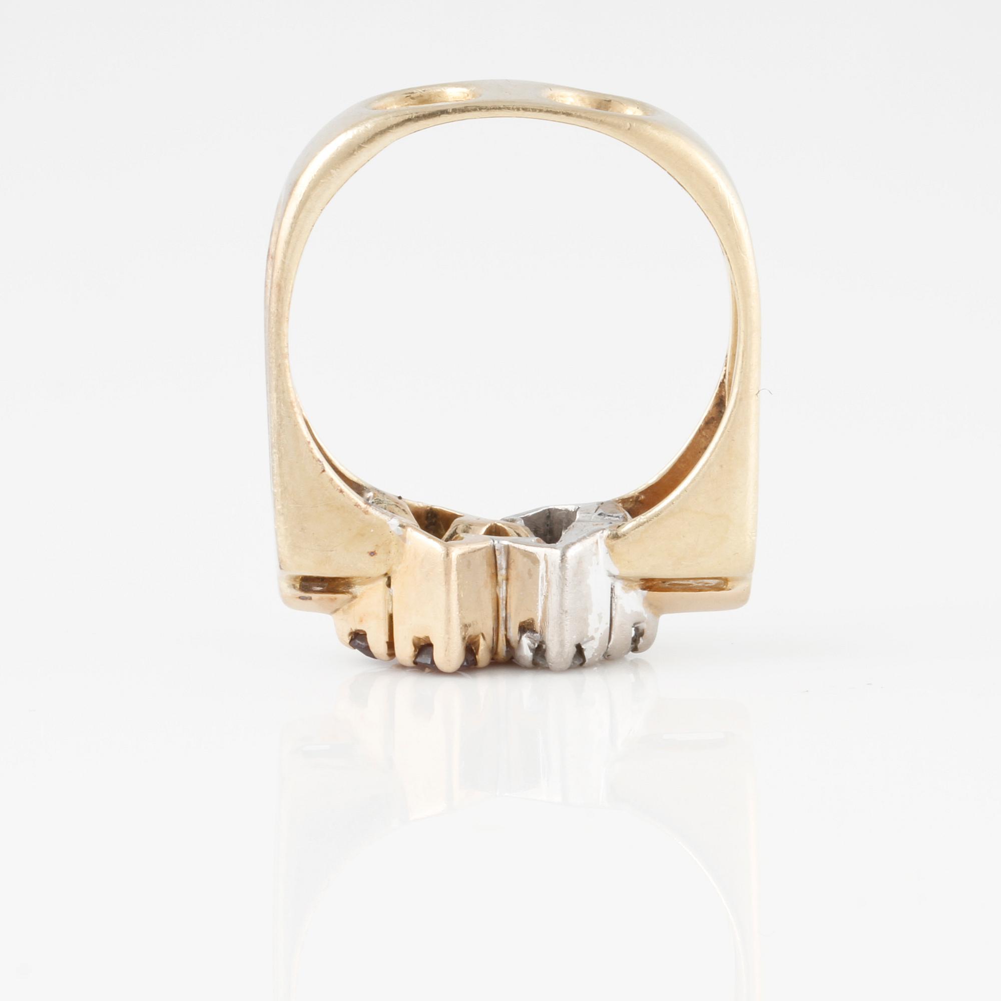 RING, med fasettslipade rubiner samt briljantslipade diamanter.