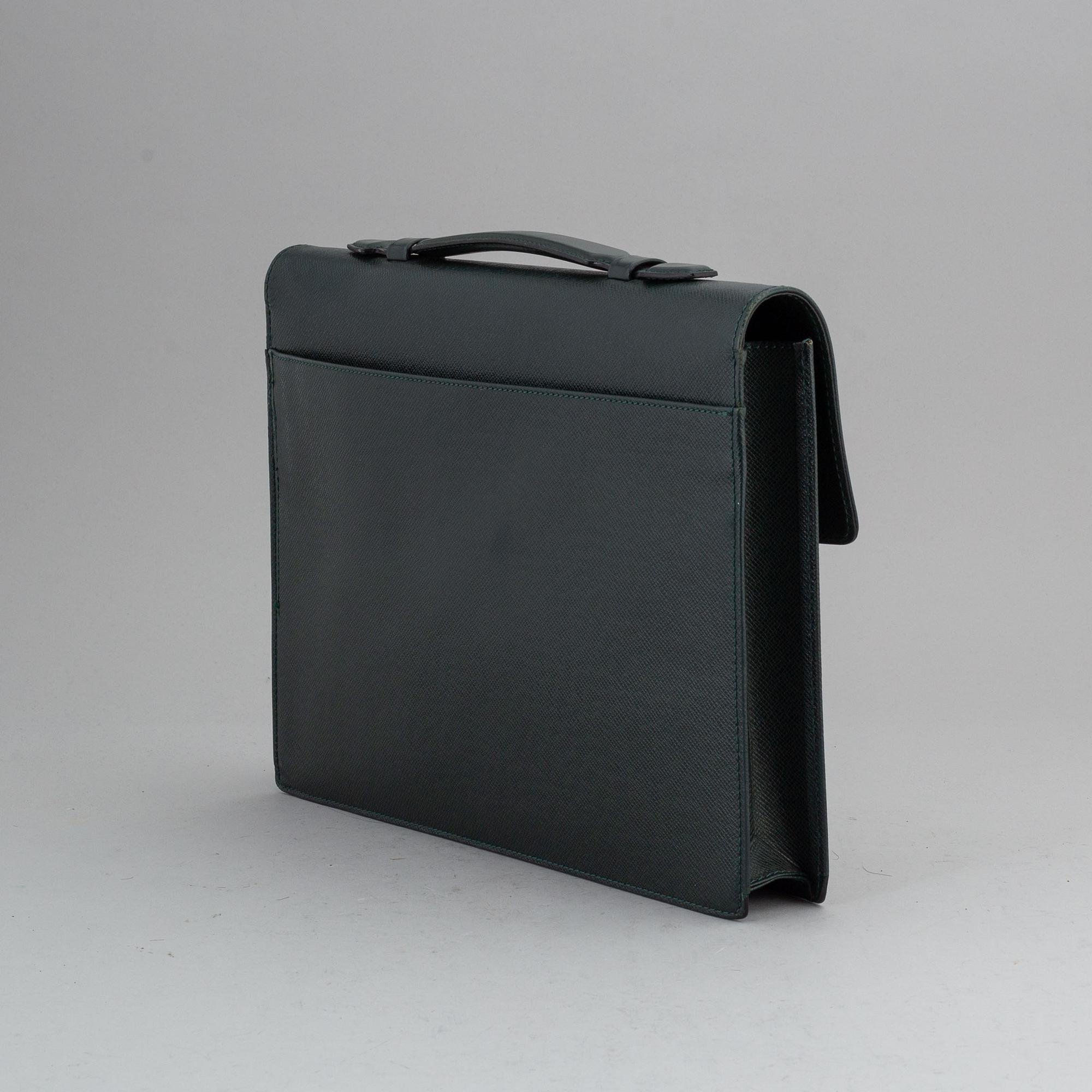 LOUIS VUITTON, a 'Taiga Serviette Kourad' briefcase.