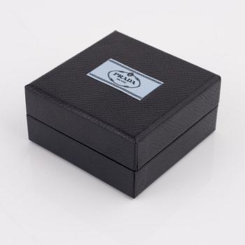 Prada, a pair of clip-on rhinestone and strass earrings.