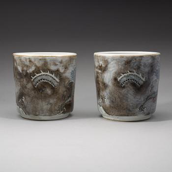 A pair of Chinese enamelled porcelain flower/scroll pots, first half of 20th Century.