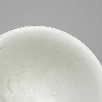 A white glazed bowl and two celadon glazed pots, Mingdynasty and older, shipwreck.