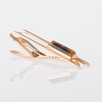 SLIPSNÅL, Elis Kauppi, Kupittaan kulta. 14K guld, tigeröga.  Vikt ca 6,3 g.