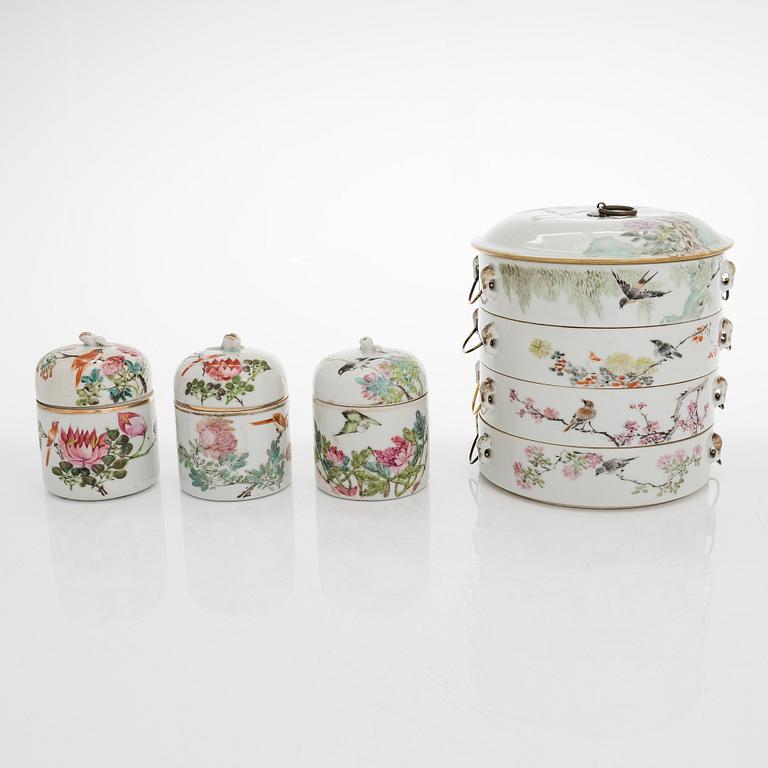 A porcelain food container and three lidded cups, China, circa 1900.