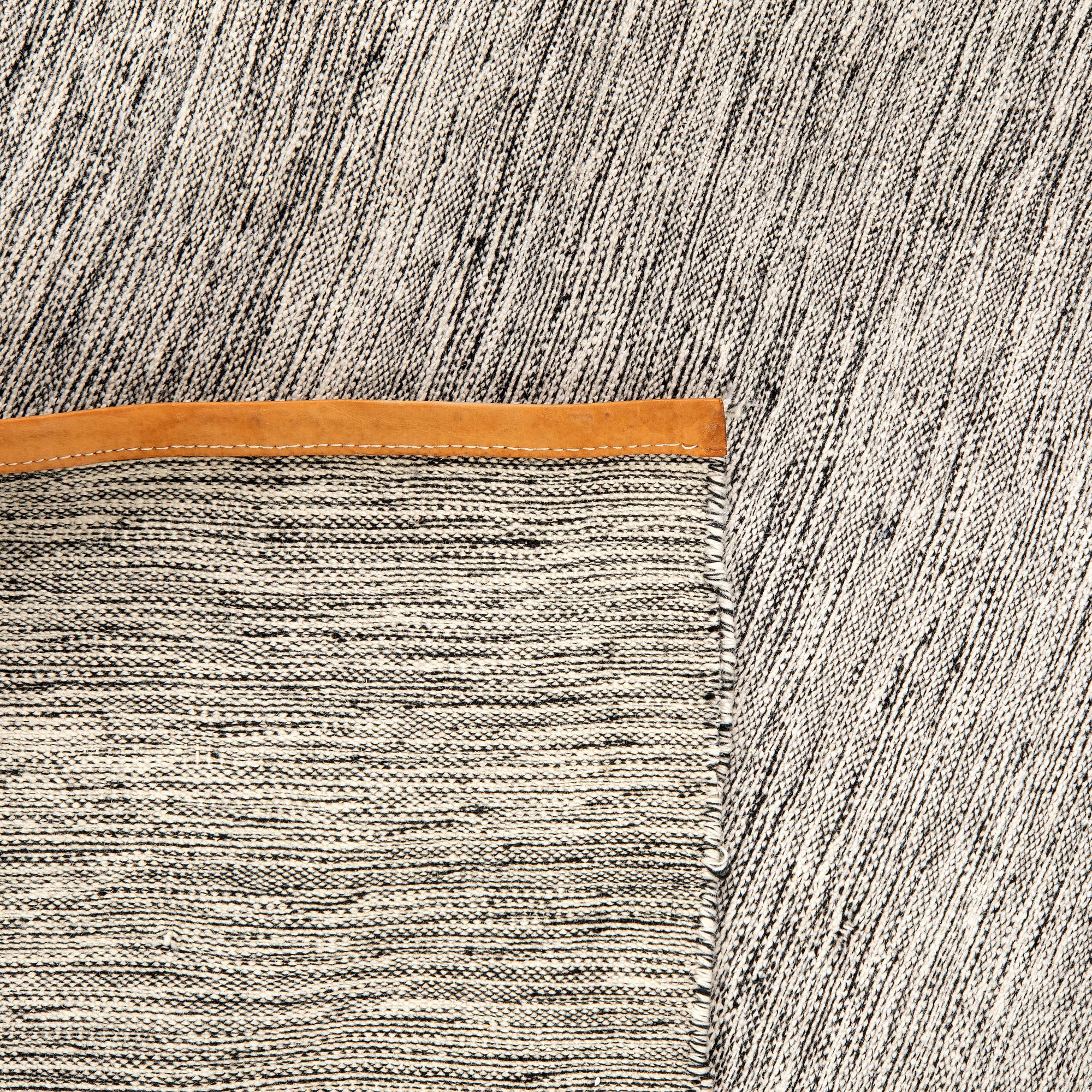 Lena Bergström rug for DesignHouse, leather-edged, approximately 288x195 cm.