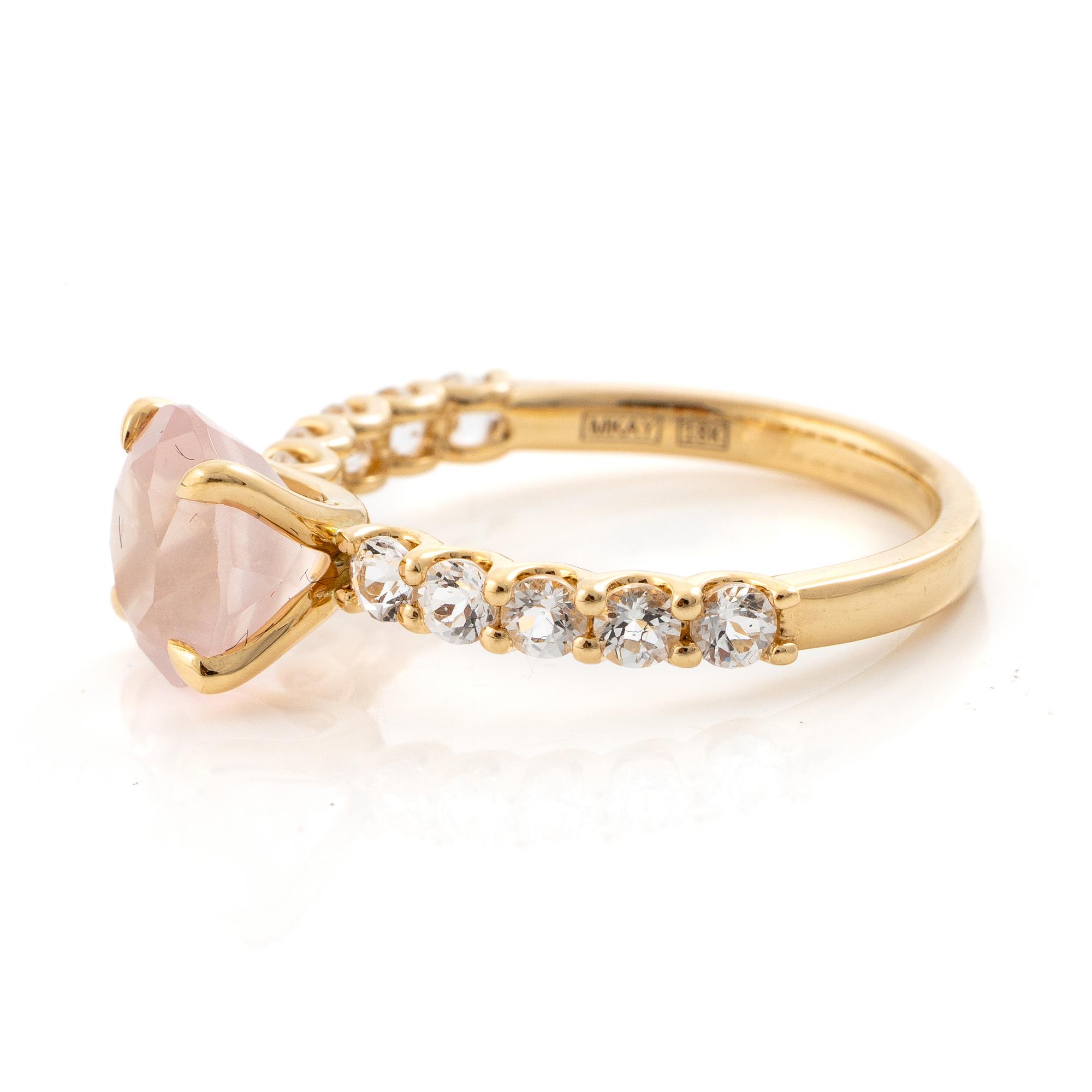 Mary Kay ring, 18K gold with a pink stone and white stones.