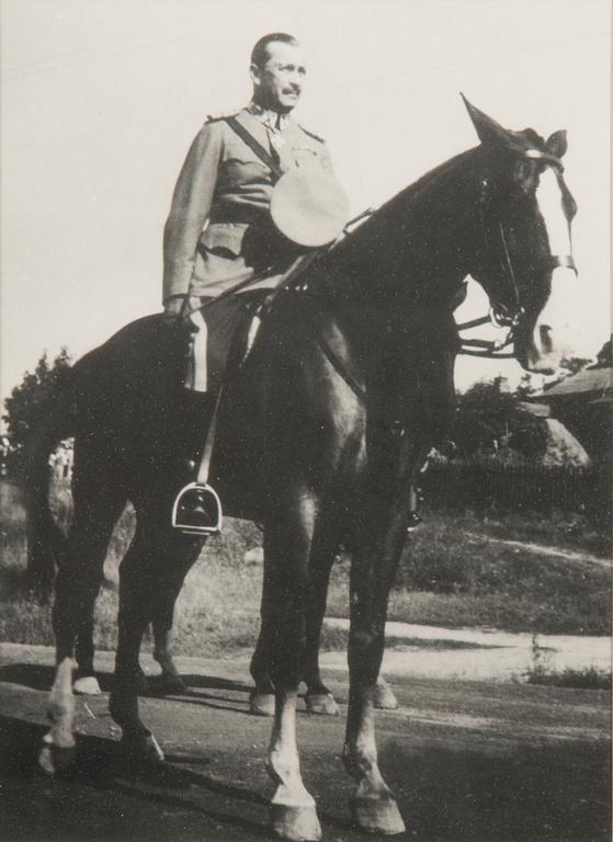 Four framed photos of Marshall Mannerheim.