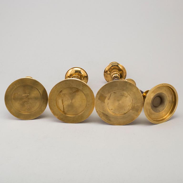 CARL HJALMAR NORRSTRÖM, after. Four brass and stone candlesticks from Skultuna, numbered 161/300, 1997.