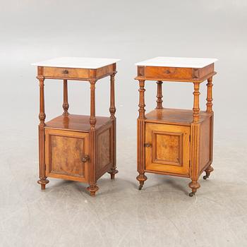 A pair of Neo Renaissance walnut bedside tables.