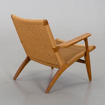 A HANS J WEGNER "CH 25" ARMCHAIR by Carl Hansen & Söner.