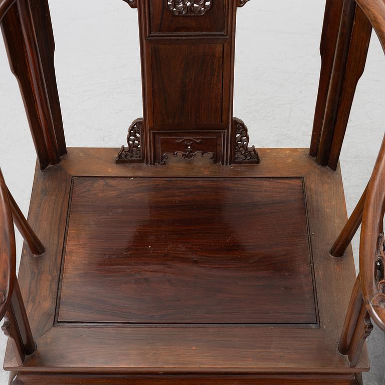 A pair of Chinese horseshoe-back hardwood armchairs, 1900s.