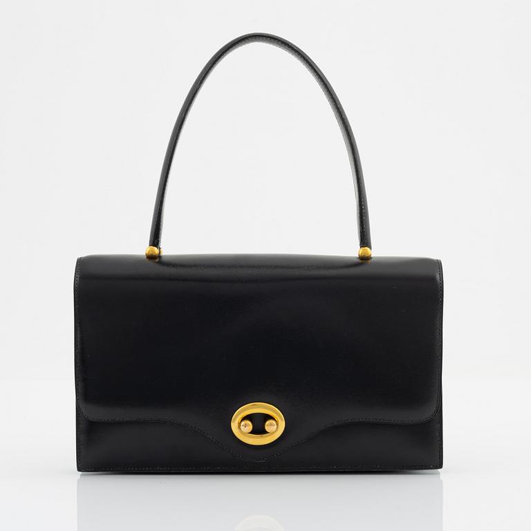 Hermès, a black leather 'Boutonniere' bag, 1960's.