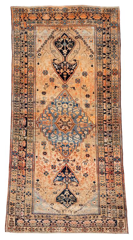 An antique part silk Kashan Motacham, ca 200 x 95,5-108 cm.