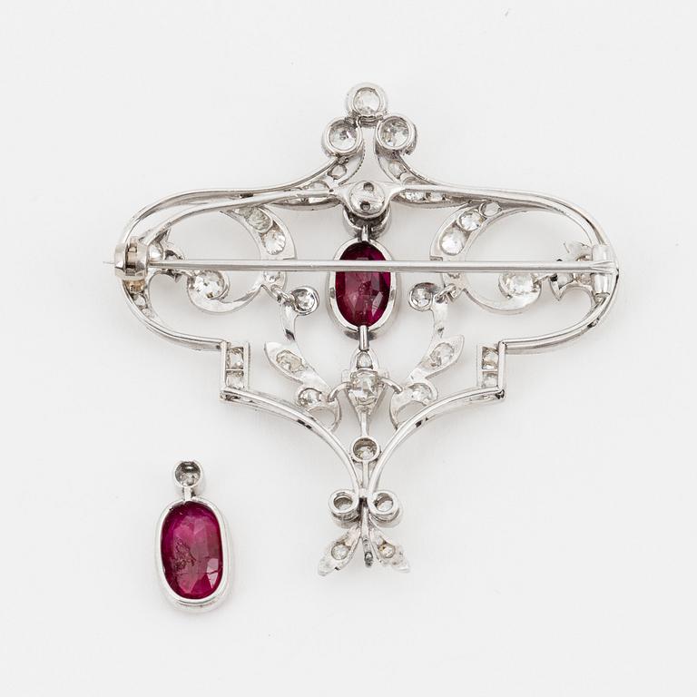 An old-cut diamond and ruby brooch.