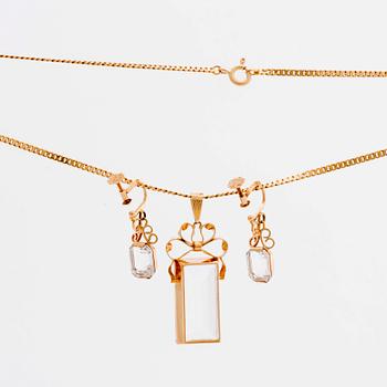 STIGBERT chainn and pendant and earrings, 18l gold and rock crystal.
