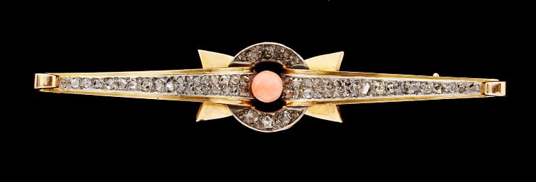 A pink coral and diamond brooch, 1940's.