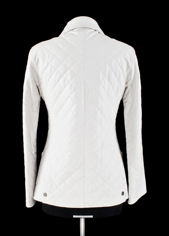 A white quilt leather jacket by Ferragamo.