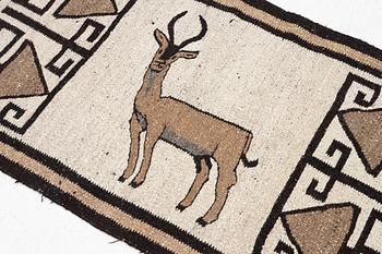 An oriental rug, c. 185 x 100 cm.