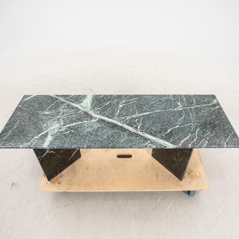 A marble coffee table alter part of the 20th century/21st century.
