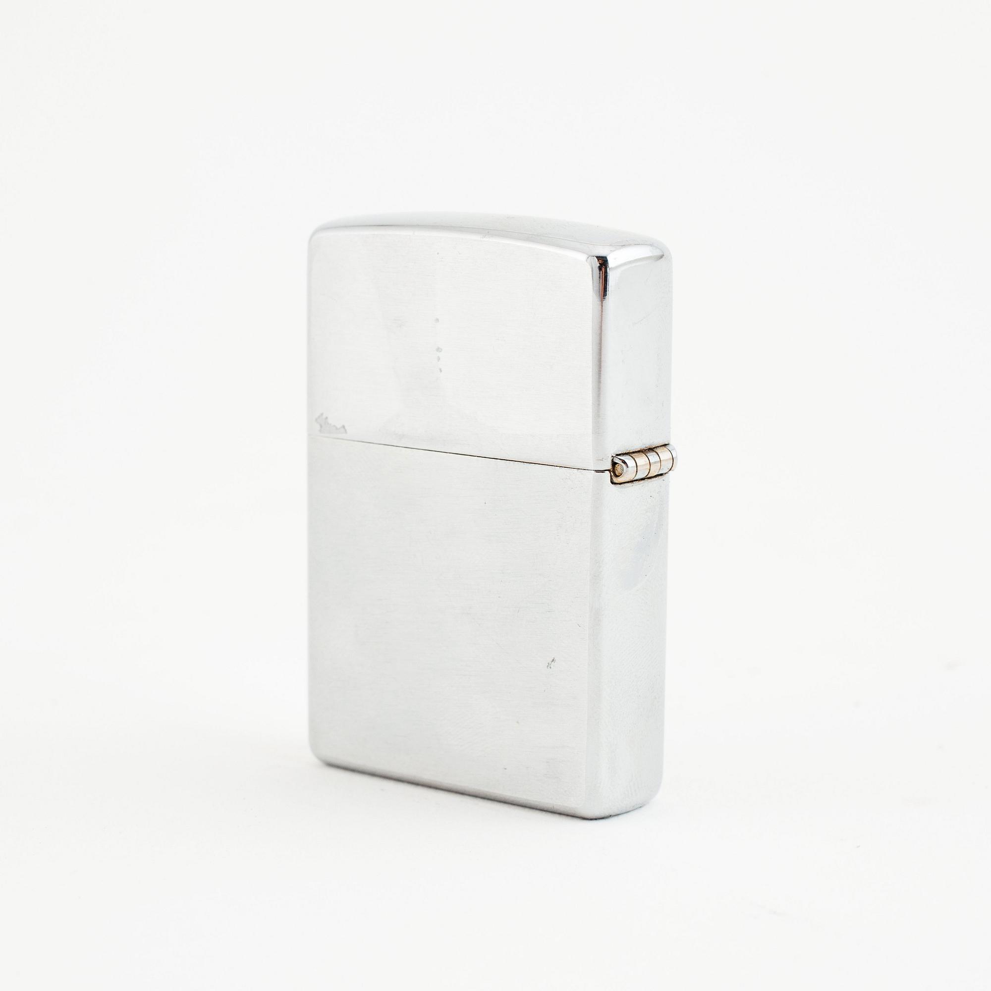 Zippo, tändare, graverad Lars Norén 1999.