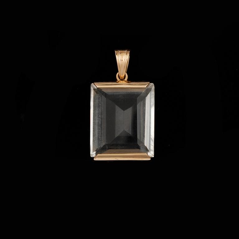 ARMRING samt HÄNGE, 18k guld med bergkristall. Total vikt ca 19,3 gram.