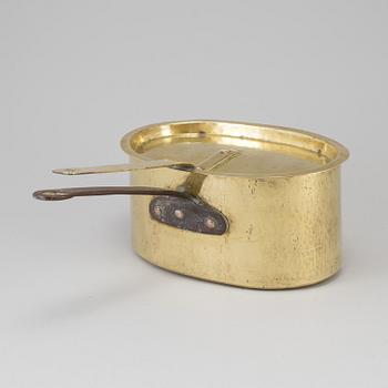 A BRASS AND CAST IRON SAUCEPAN AND COVER, 18th century.