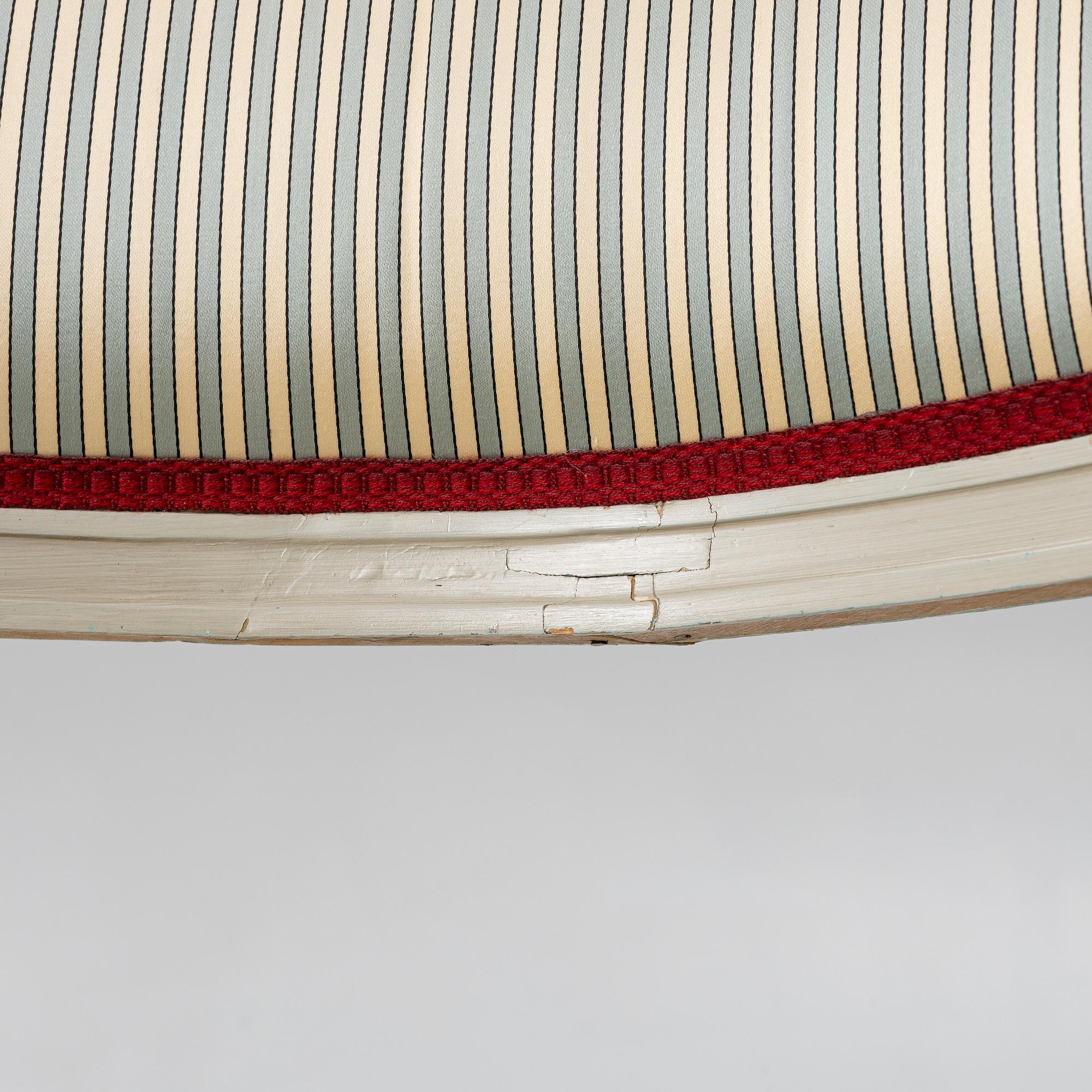 A late Gustavian style armchair, late 20th Century.