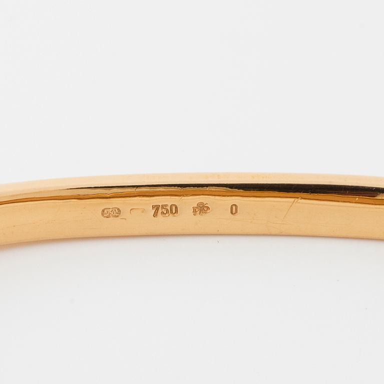 A single cut diamond bangle.