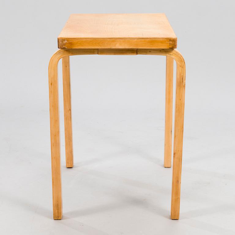 ALVAR AALTO, An early 1930s side table, marked "Aalto Design Made in Finland".