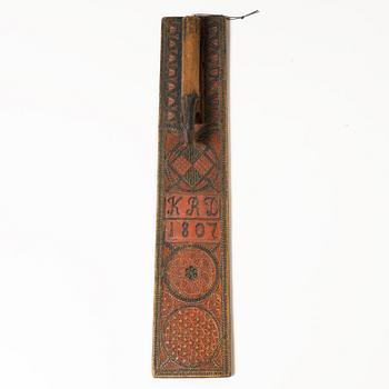 A painted wooden mangle board, Southern Sweden, dated 1807.