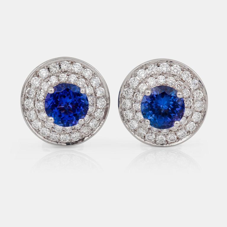 A pair of 3.60 ct tanzanite an brilliant-cut diamond earrings. Total carat weight of diamonds circa 1.60ct.