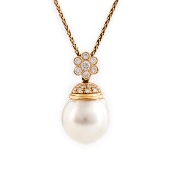 An 18K gold and cultured South Sea pearl pendant set with round brilliant-cut diamonds.