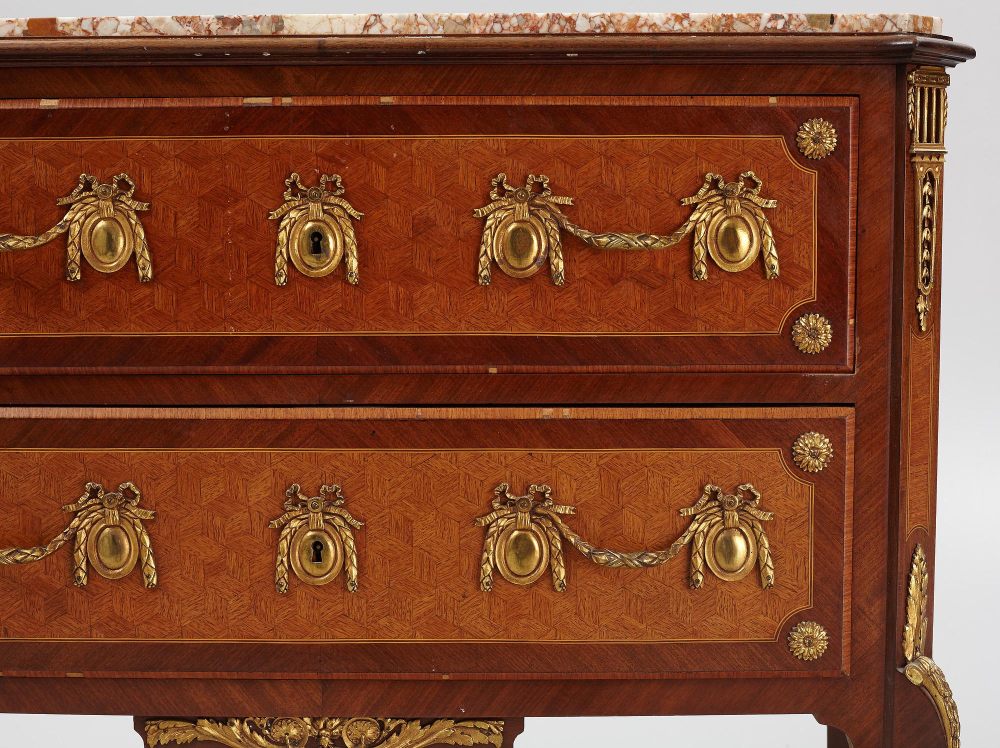 A Louis XVI-style bureau from the second half of the 20th century.