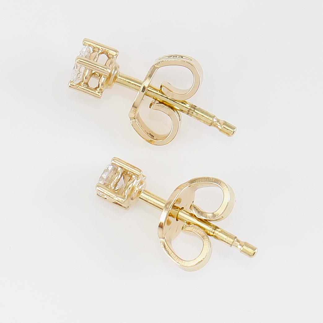 ÖRHÄNGEN, 1 par, 18K guld och diamanter tot ca 0.24 ct.