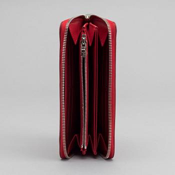 A Louis Vuitton zippy wallet.