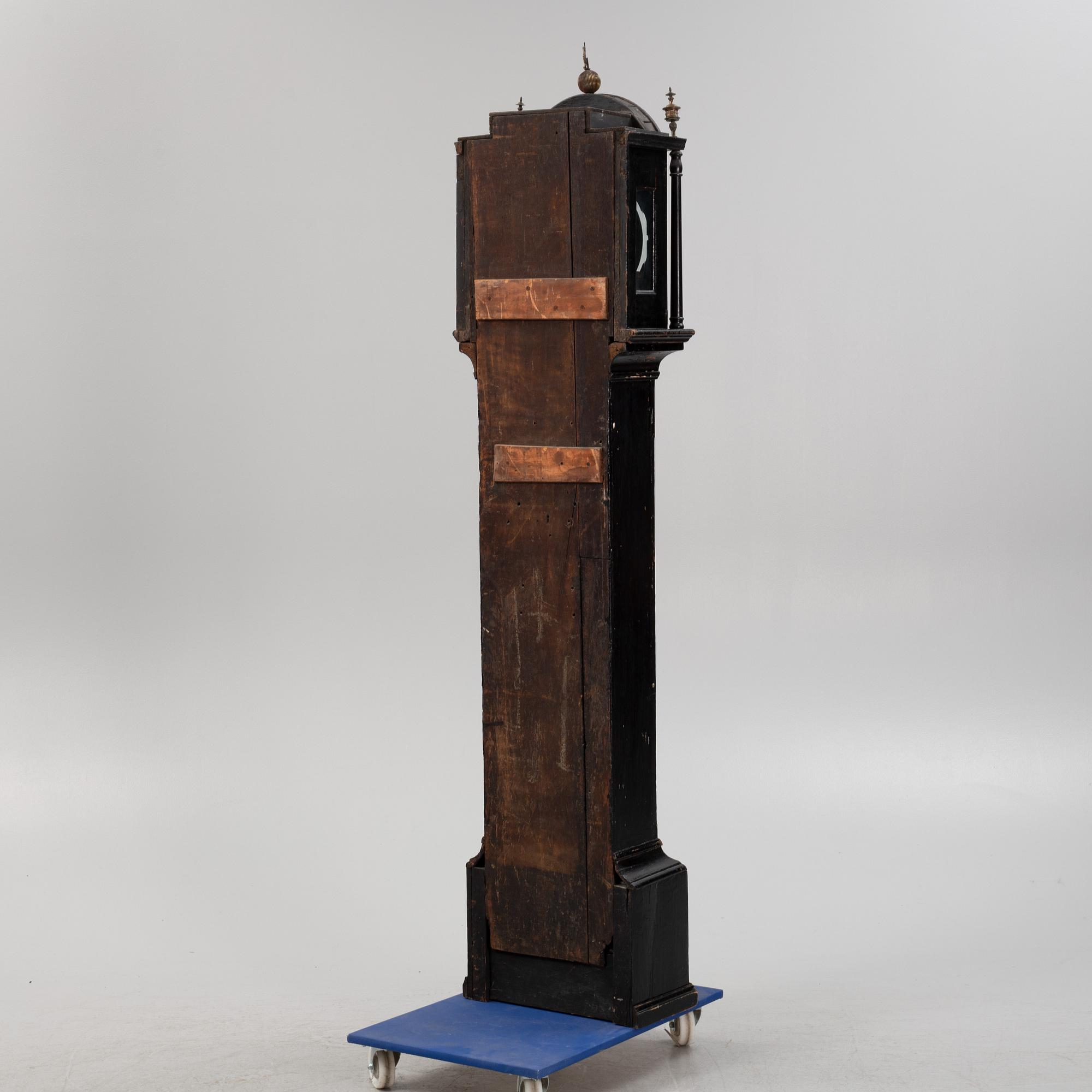 A longcase clock, England, 18th century, marked Wilson London.