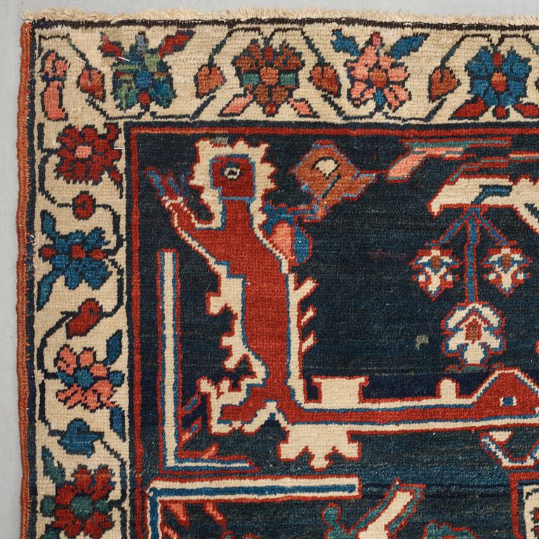A CARPET, an antique Bakshaish, ca 693 x 398,5 cm, dated "1298"AH/1880 AD probably.