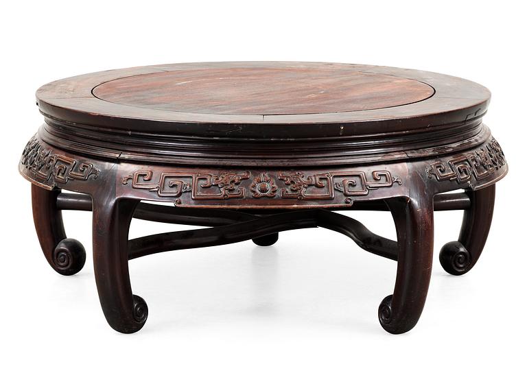 A round hardwood table, Qing dynasty.