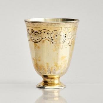 A German 18th century gilt-silver beaker on foot, mark of Johann Gottfried Hildebrand, Berlin probably 1760s.