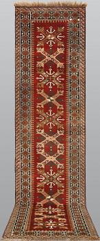 A semi-antique Anatolian carpet, c. 390 x 94 cm.